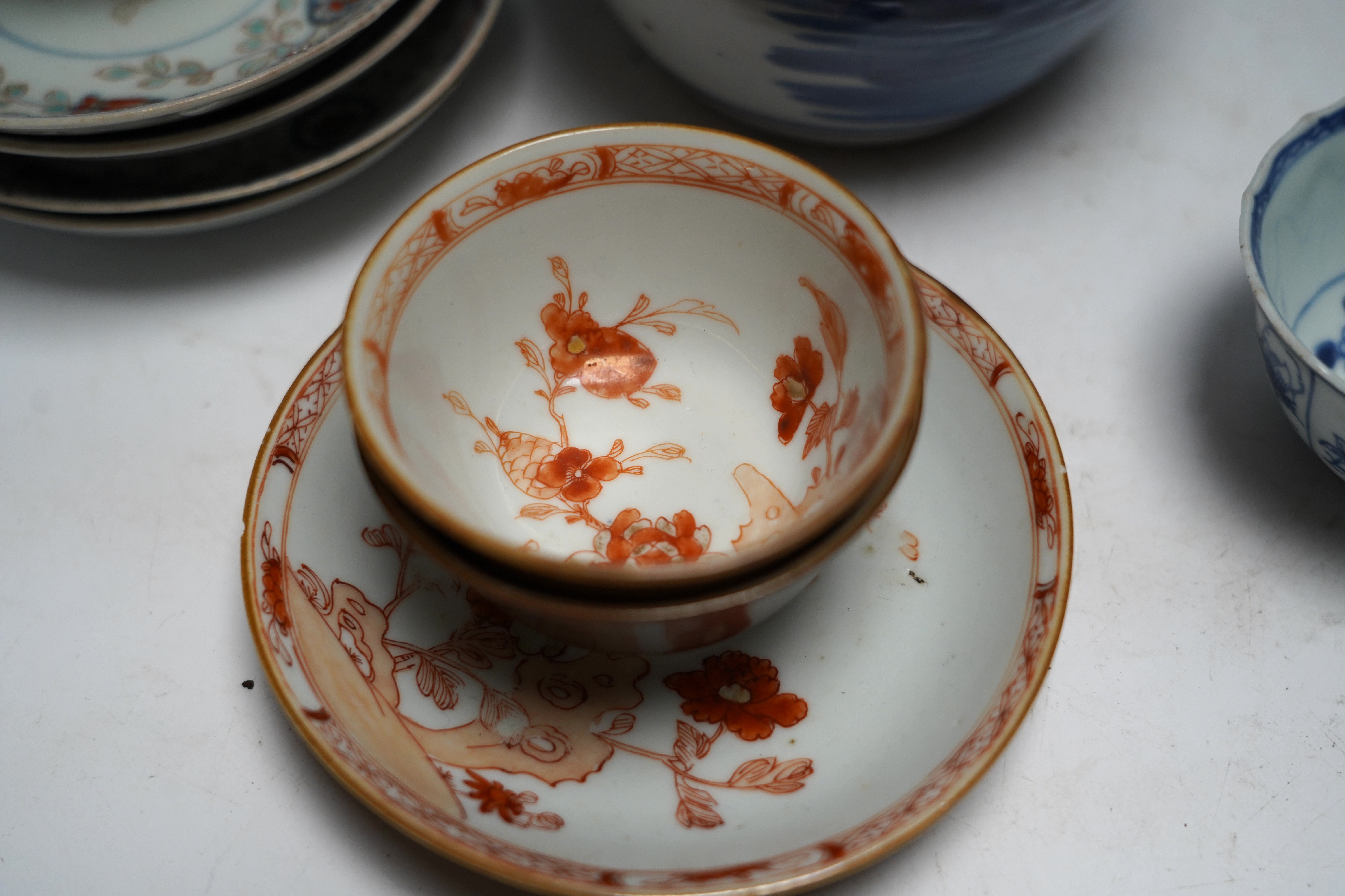 A group of 18th century Chinese and Japanese porcelain including blue and white bowls and jar with hardwood cover, largest 19cm in diameter